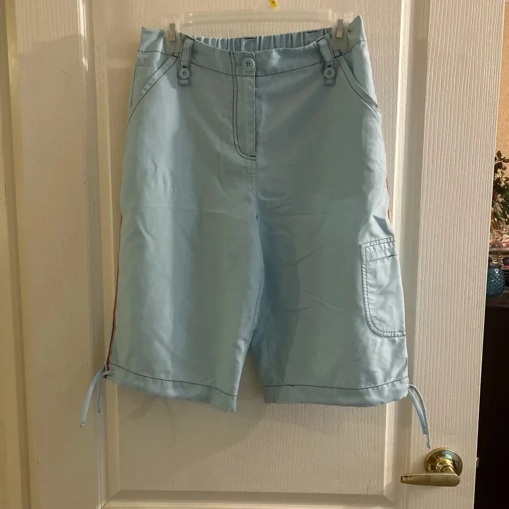 FUDA sky blue shorts vintage size large with pin stripe down the leg, pockets.